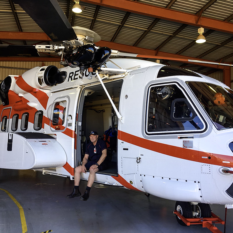 Person sitting on a helicopter